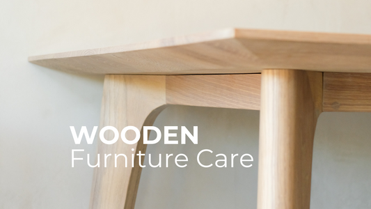 Picture of a wooden table corner and the words written: Wooden Furniture Care